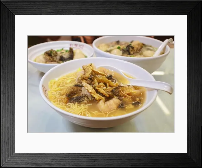 Framed Print : A bowl of Wonton noodles with fried fish skin topping Framed Print : A bowl of Wonton noodles with fried fish skin topping