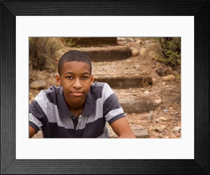 Framed Print : Handsome African-American male in natural surroundings