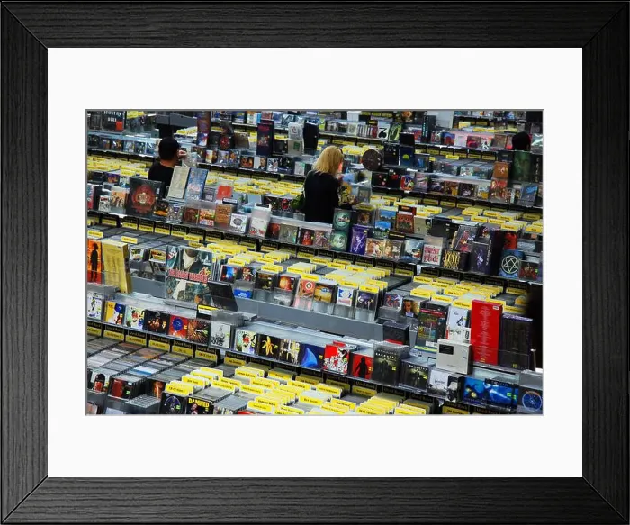 Framed Print : People search for their favorite music artists albums in Amoeba Music, a legendary record store in Los Angeles Framed Print : People search for their favorite music artists albums in Amoeba Music, a legendary record store in Los Angeles