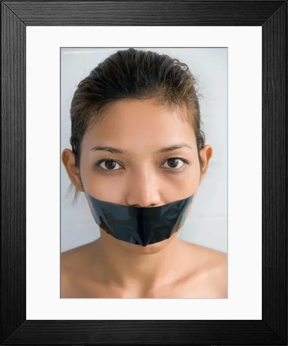 Framed Print : Young woman with mouth sealed Framed Print : Young woman with mouth sealed