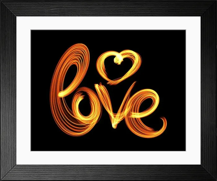 Framed Print : Love isolated word lettering and heart written with fire flame or smoke on black background Framed Print : Love isolated word lettering and heart written with fire flame or smoke on black background