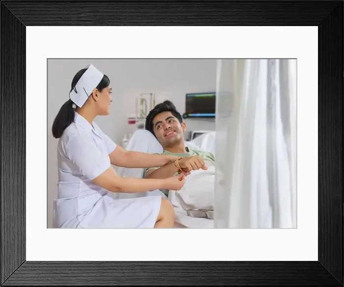 Framed Print : NURSE IN THE ROLE OF A SISTER TYING RAKHI TO THE BOY ADMITTED IN THE HOSPITAL Framed Print : NURSE IN THE ROLE OF A SISTER TYING RAKHI TO THE BOY ADMITTED IN THE HOSPITAL