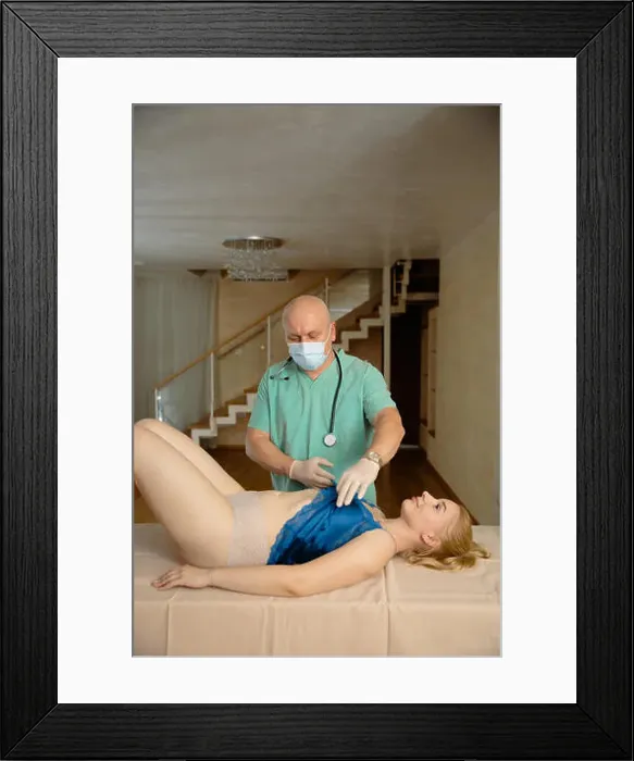 Framed Print : Healthcare and medical examination concept - doctor with woman patient at home - Laying down - Green hospital uniform Framed Print : Healthcare and medical examination concept - doctor with woman patient at home - Laying down - Green hospital uniform