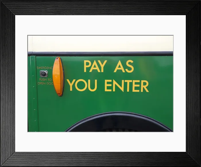 Framed Print : Pay As You Enter sign on the outside by the front door of a bus from the 1960s Framed Print : Pay As You Enter sign on the outside by the front door of a bus from the 1960s