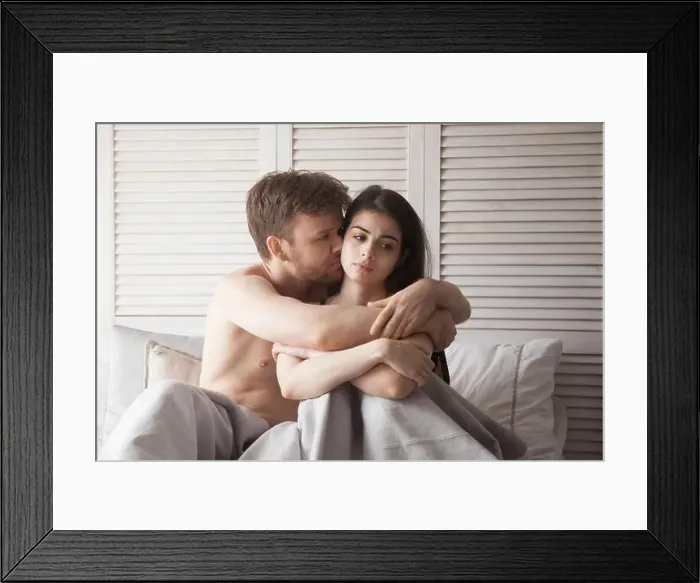 Framed Print : Boyfriend hugging girlfriend asking for forgiveness