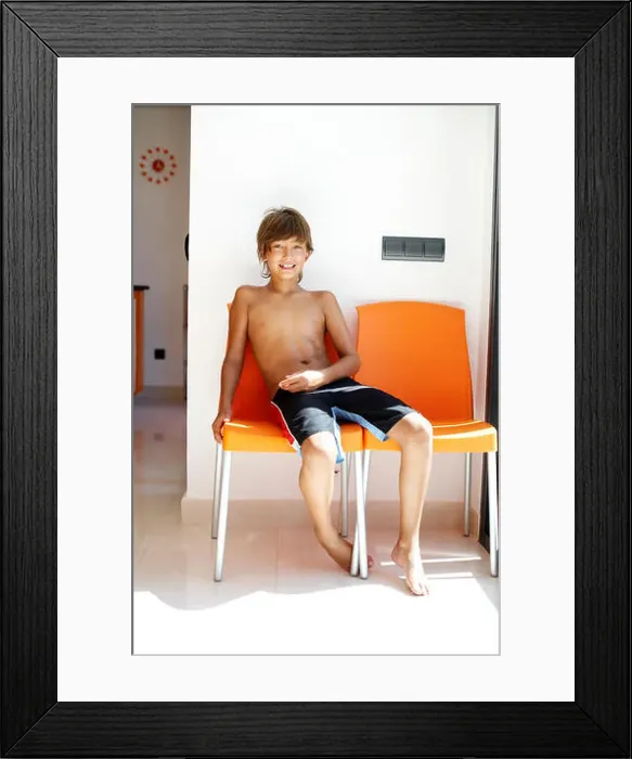 Framed Print : Young boy in a chair Framed Print : Young boy in a chair