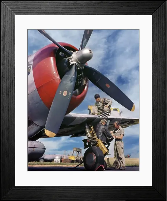 Framed Print : Armourers loading ammunition and bombs on a Republic P-47 Thunderbolt Framed Print : Armourers loading ammunition and bombs on a Republic P-47 Thunderbolt