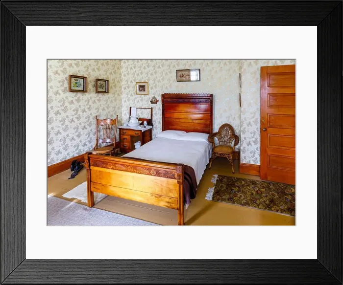 Framed Print : Traditional 19th century bedroom and carved wooden double bed in the museum at Billings Farm & Museum Framed Print : Traditional 19th century bedroom and carved wooden double bed in the museum at Billings Farm & Museum