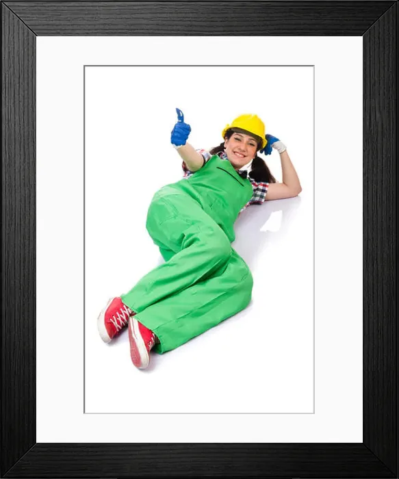 Framed Print : Female workman in green overalls isolated on white Framed Print : Female workman in green overalls isolated on white