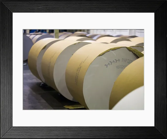 Framed Print : Infinite Rolls of Newsprint paper. Huge rolls of newsprint wait in storage to feed the next newspaper print run Framed Print : Infinite Rolls of Newsprint paper. Huge rolls of newsprint wait in storage to feed the next newspaper print run