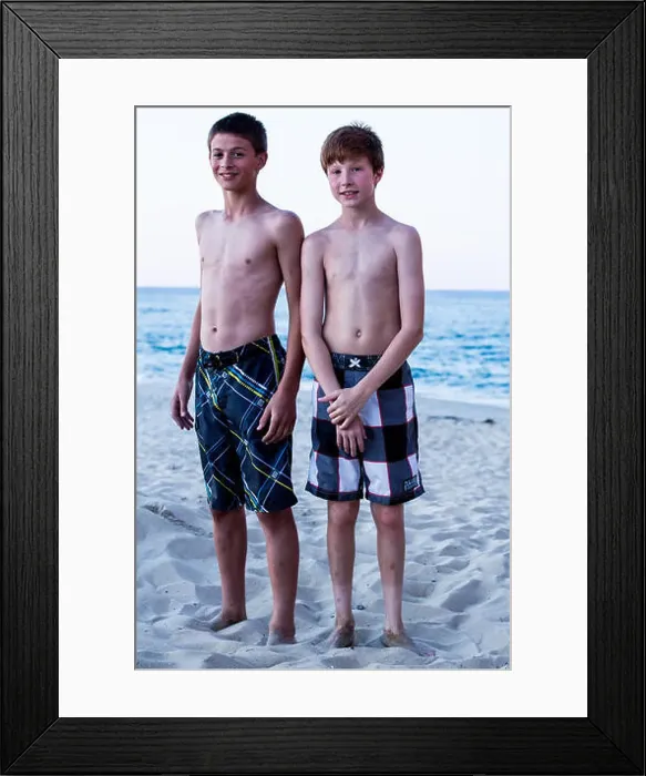 Framed Print : Portrait of two boys standing on beach
