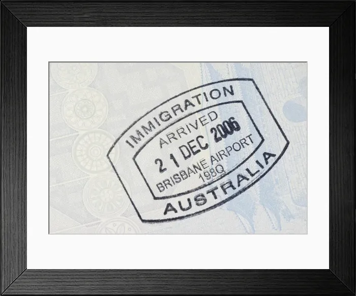 Framed Print : Australia immigration entry stamp on the inside page of a passport. Space for copy Framed Print : Australia immigration entry stamp on the inside page of a passport. Space for copy