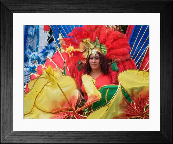 Framed Print : 2022 August 29 - UK - Yorkshire - Leeds West Indian Carnival - Colourful trope leader in the parade on Harehills Lane Framed Print : 2022 August 29 - UK - Yorkshire - Leeds West Indian Carnival - Colourful trope leader in the parade on Harehills Lane