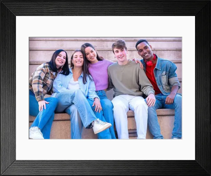Framed Print : Smiling Teenagers sitting on stairs hugging each other looking at camera Framed Print : Smiling Teenagers sitting on stairs hugging each other looking at camera