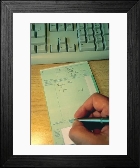 Framed Print : Doctor writing prescription for Viagra tablets for elderly male patient United Kingdom NHS Great Britain UK Framed Print : Doctor writing prescription for Viagra tablets for elderly male patient United Kingdom NHS Great Britain UK