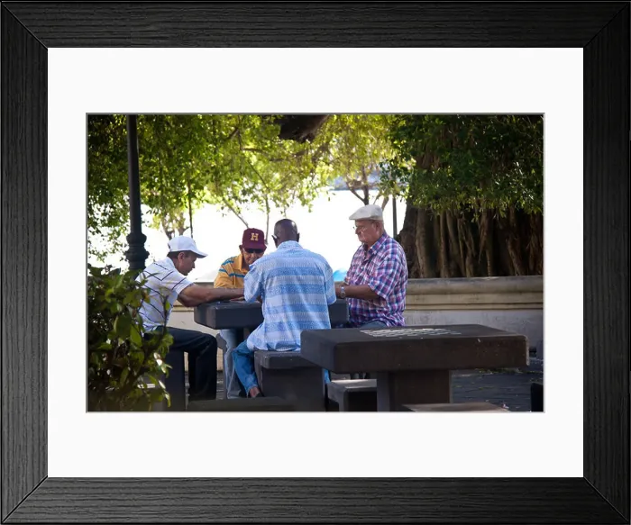 Framed Print : Men playing dominoes in a shady public park in Old San Juan, Puerto Rico Framed Print : Men playing dominoes in a shady public park in Old San Juan, Puerto Rico