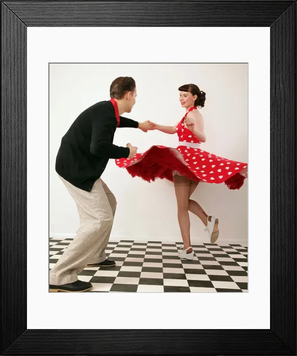 Framed Print : Boy and girl in 1950's clothes dancing Framed Print : Boy and girl in 1950's clothes dancing