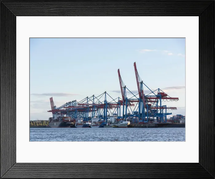 Framed Print : Container ships being loaded and unloaded at the container terminal Altenwerder, Hamburg, Germany Framed Print : Container ships being loaded and unloaded at the container terminal Altenwerder, Hamburg, Germany