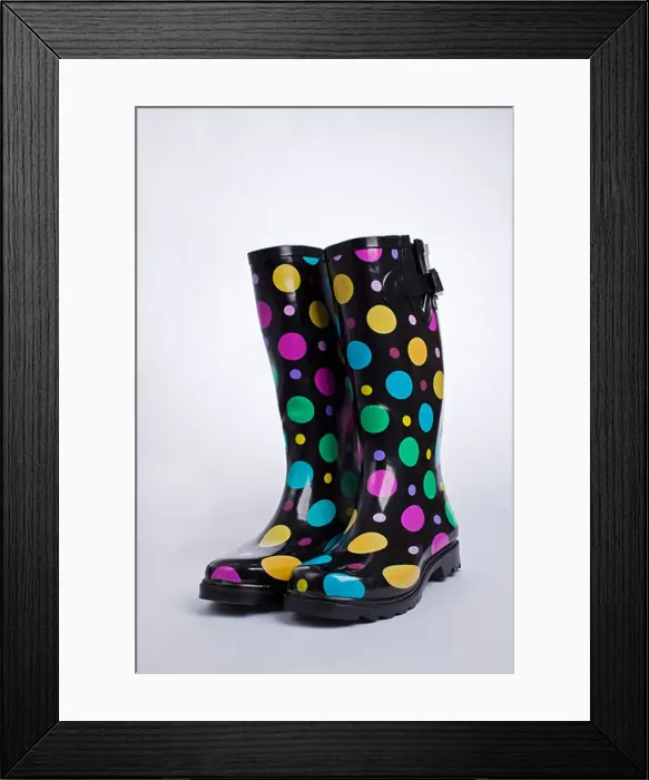 Framed Print : A pair of brightly spotted wellies Framed Print : A pair of brightly spotted wellies