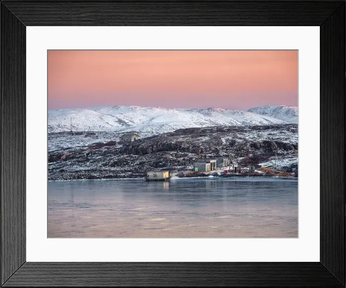 Framed Print : Old fishing lodge on the beach mountain hard-to-reach lakes in Arctic winter. Northern wildlife