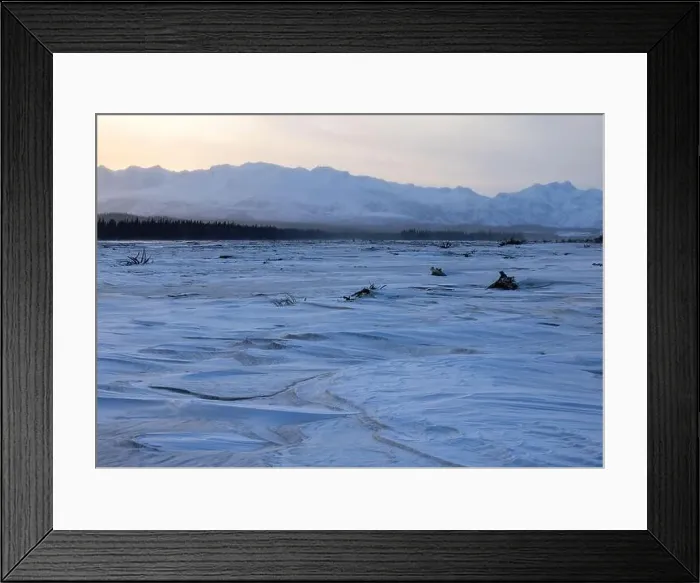 Framed Print : Sun rising over mountains behind frozen river covered in snow on the winter solstice in interior Alaska Framed Print : Sun rising over mountains behind frozen river covered in snow on the winter solstice in interior Alaska