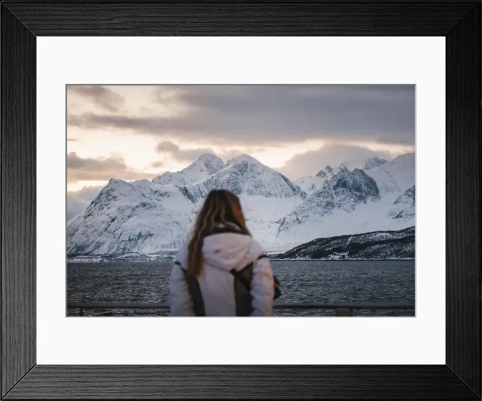Framed Print : Lyngen Alps mountains at sunset behind woman on boat in arctic Norway Framed Print : Lyngen Alps mountains at sunset behind woman on boat in arctic Norway