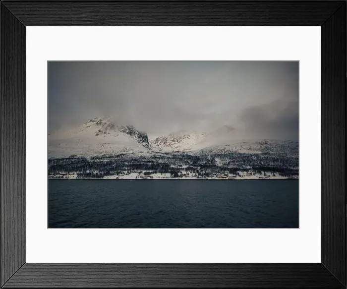 Framed Print : Clouds over mountain view in the Lyngen Alps in northern Norway in winter Framed Print : Clouds over mountain view in the Lyngen Alps in northern Norway in winter