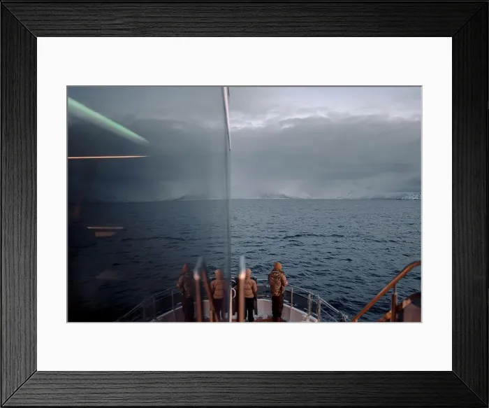 Framed Print : People watching the arctic ocean from the front of tour boat in northern Norway Framed Print : People watching the arctic ocean from the front of tour boat in northern Norway