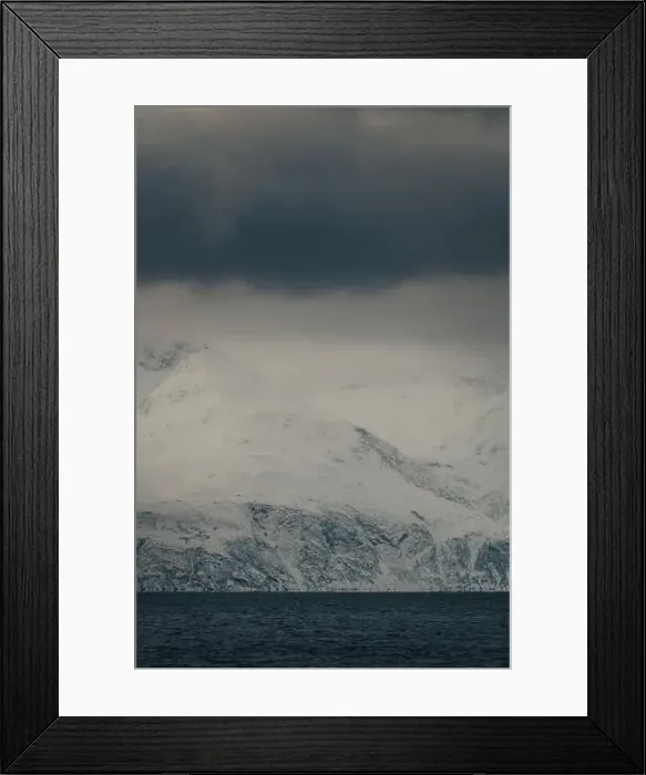 Framed Print : Lyngen Alps mountains under thick grey clouds in the arctic, northern Norway Framed Print : Lyngen Alps mountains under thick grey clouds in the arctic, northern Norway