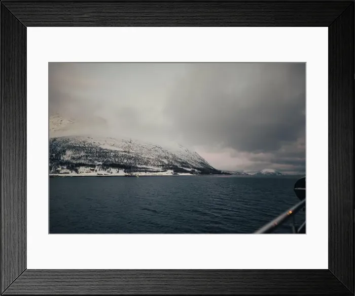 Framed Print : Snowy mountains under clouds by the arctic ocean in northern Norway Framed Print : Snowy mountains under clouds by the arctic ocean in northern Norway