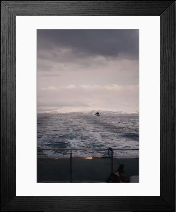 Framed Print : Boat in the distance on the arctic ocean in northern Norway in winter Framed Print : Boat in the distance on the arctic ocean in northern Norway in winter