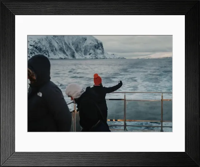 Framed Print : Woman in red hat taking selfie on arctic ocean tour boat in the Lyngen Alps Framed Print : Woman in red hat taking selfie on arctic ocean tour boat in the Lyngen Alps