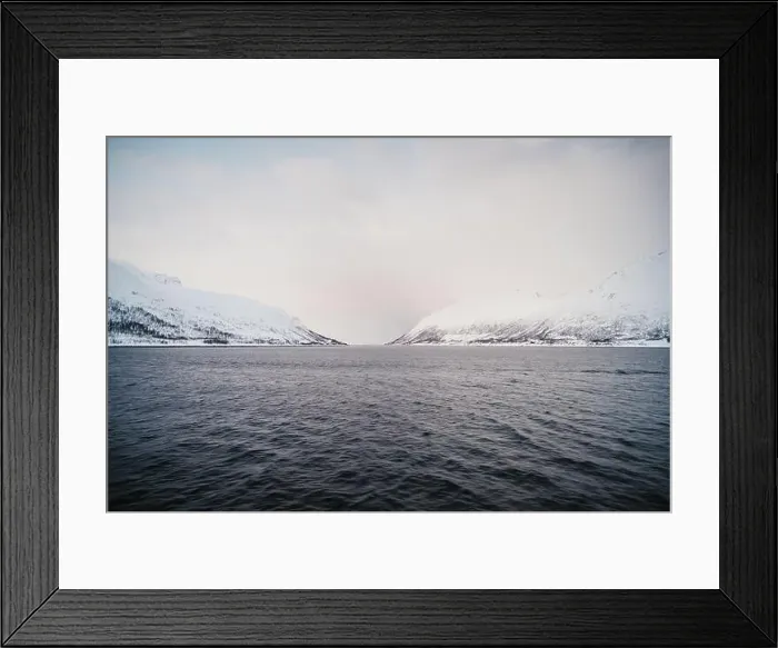 Framed Print : Fjord between snowy mountains in the Lyngen Alps in northern arctic Norway Framed Print : Fjord between snowy mountains in the Lyngen Alps in northern arctic Norway