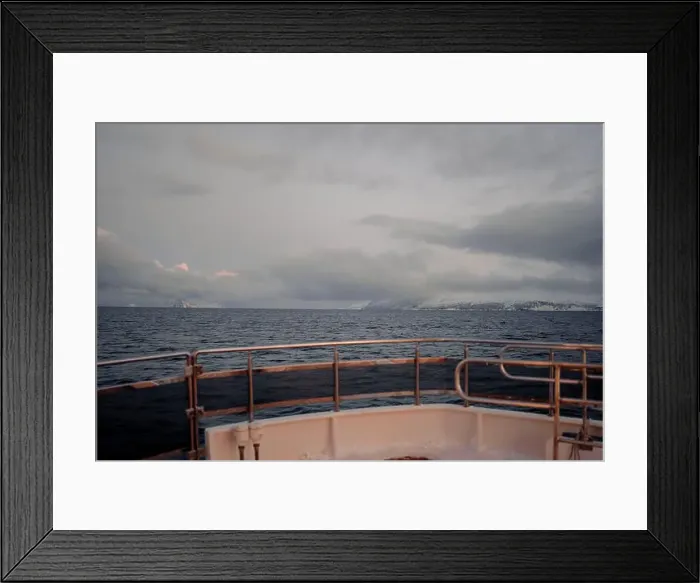 Framed Print : Distant mountains, shot from boat on the arctic ocean in winter, northern Norway Framed Print : Distant mountains, shot from boat on the arctic ocean in winter, northern Norway