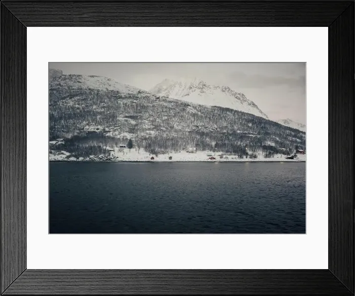 Framed Print : Wooden cabins on the waterfront of the arctic ocean on snowy Lyngen Alps hill Framed Print : Wooden cabins on the waterfront of the arctic ocean on snowy Lyngen Alps hill
