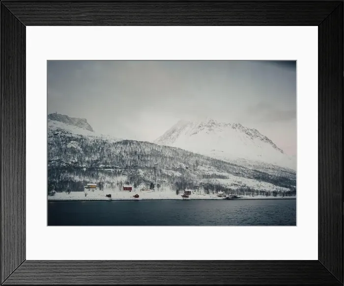 Framed Print : Cabins in northern Norway in the Lyngen Alps by the arctic ocean in winter Framed Print : Cabins in northern Norway in the Lyngen Alps by the arctic ocean in winter