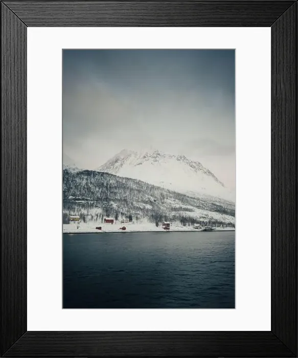 Framed Print : Cabins in the snow by the arctic ocean in the Lyngen Alps in arctic Norway Framed Print : Cabins in the snow by the arctic ocean in the Lyngen Alps in arctic Norway