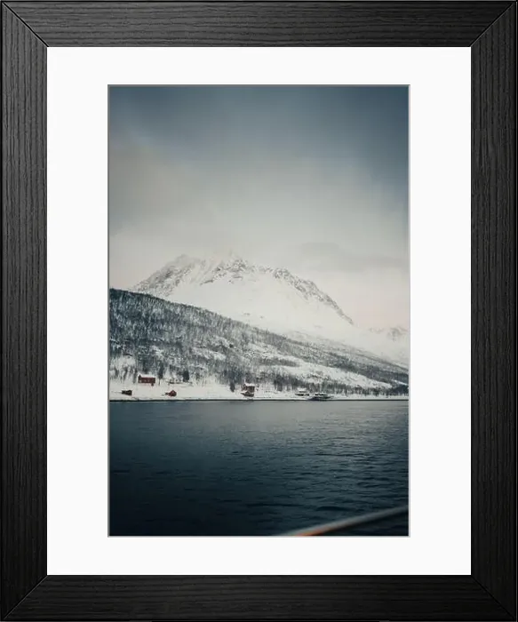 Framed Print : Cabins in arctic Norway by the ocean in the snowy Lyngen Alps Framed Print : Cabins in arctic Norway by the ocean in the snowy Lyngen Alps