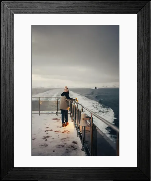 Framed Print : Woman holding boat rail on Norwegian arctic fjord in winter near Tromso Framed Print : Woman holding boat rail on Norwegian arctic fjord in winter near Tromso