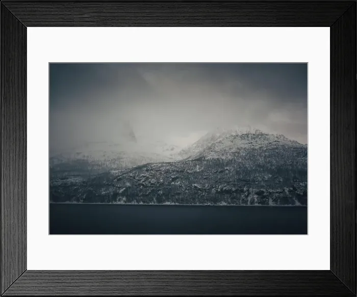 Framed Print : Snowy Lyngen Alps mountain view from boat in Norwegian fjord on tour from Tromso Framed Print : Snowy Lyngen Alps mountain view from boat in Norwegian fjord on tour from Tromso