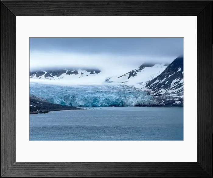 Framed Print : cruising in the Arctic in the Magdalensfjord on Svalbard along a glacier Framed Print : cruising in the Arctic in the Magdalensfjord on Svalbard along a glacier