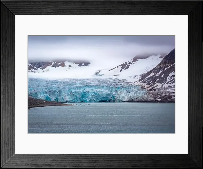Framed Print : cruising in the Arctic in the Magdalensfjord on Svalbard along a glacier Framed Print : cruising in the Arctic in the Magdalensfjord on Svalbard along a glacier