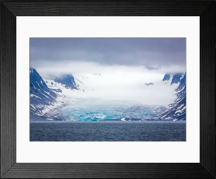 Framed Print : cruising in the Arctic in the Magdalensfjord on Svalbard along a glacier Framed Print : cruising in the Arctic in the Magdalensfjord on Svalbard along a glacier
