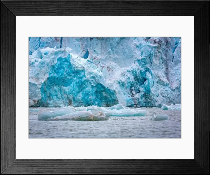 Framed Print : cruising in the Arctic in the Magdalensfjord on Svalbard along a glacier Framed Print : cruising in the Arctic in the Magdalensfjord on Svalbard along a glacier