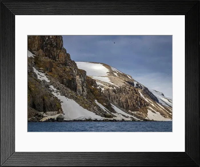 Framed Print : rocks waterfall small iceberg and glacier at the Alkefjellet between Spitsbergen and Nordaustlandet on Svalbard, Norway Framed Print : rocks waterfall small iceberg and glacier at the Alkefjellet between Spitsbergen and Nordaustlandet on Svalbard, Norway