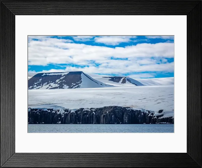 Framed Print : rocks waterfall small iceberg and glacier at the Alkefjellet between Spitsbergen and Nordaustlandet on Svalbard, Norway Framed Print : rocks waterfall small iceberg and glacier at the Alkefjellet between Spitsbergen and Nordaustlandet on Svalbard, Norway