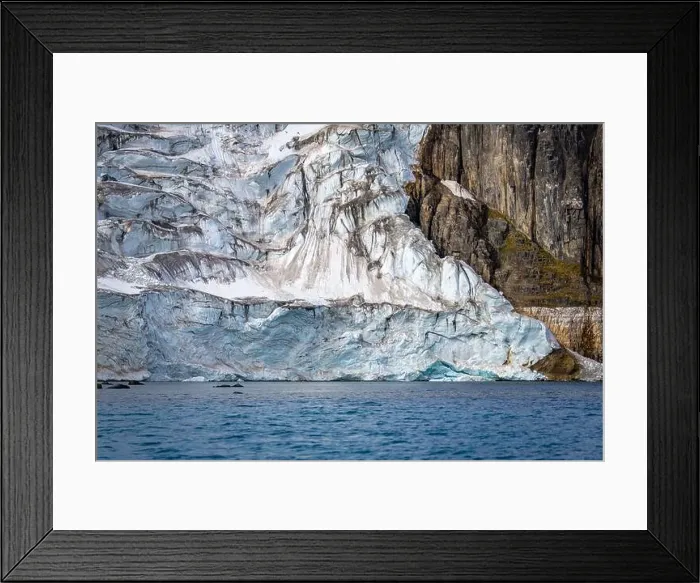 Framed Print : rocks waterfall small iceberg and glacier at the Alkefjellet between Spitsbergen and Nordaustlandet on Svalbard, Norway Framed Print : rocks waterfall small iceberg and glacier at the Alkefjellet between Spitsbergen and Nordaustlandet on Svalbard, Norway