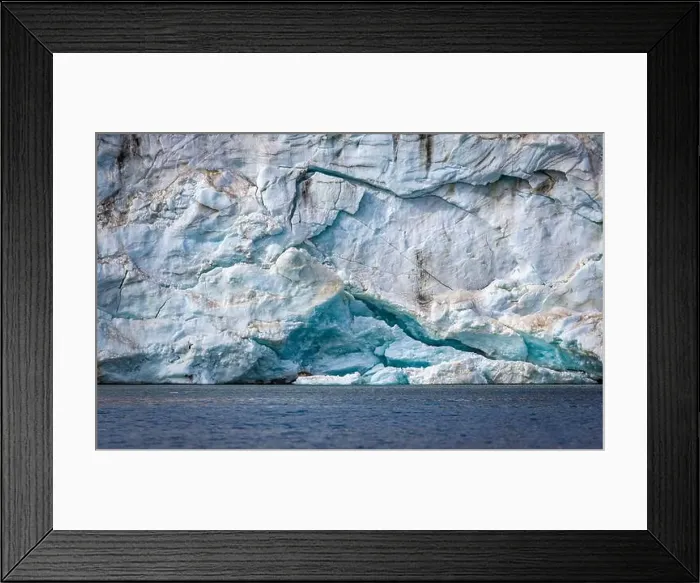 Framed Print : rocks waterfall small iceberg and glacier at the Alkefjellet between Spitsbergen and Nordaustlandet on Svalbard, Norway Framed Print : rocks waterfall small iceberg and glacier at the Alkefjellet between Spitsbergen and Nordaustlandet on Svalbard, Norway