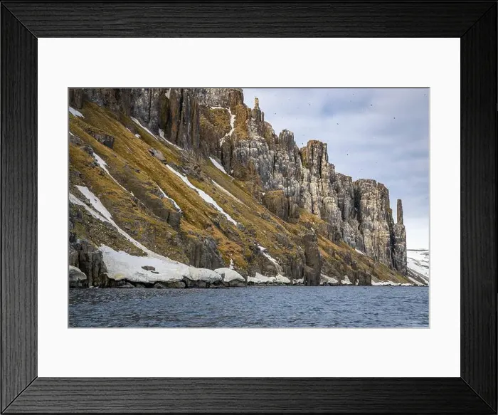 Framed Print : rocks waterfall small icebergs at the Alkefjellet between Spitsbergen and Nordaustlandet on Svalbard, Norway Framed Print : rocks waterfall small icebergs at the Alkefjellet between Spitsbergen and Nordaustlandet on Svalbard, Norway