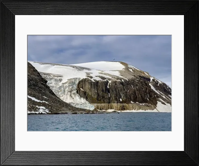 Framed Print : rocks waterfall small iceberg and glacier at the Alkefjellet between Spitsbergen and Nordaustlandet on Svalbard, Norway Framed Print : rocks waterfall small iceberg and glacier at the Alkefjellet between Spitsbergen and Nordaustlandet on Svalbard, Norway